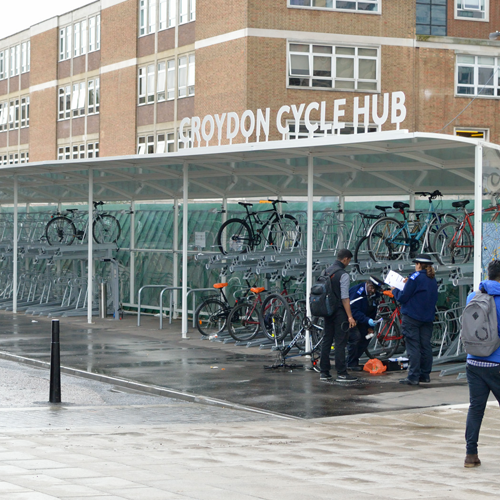 A two-tier undercover bike storage facility labelled Croydon Cycle Hub.