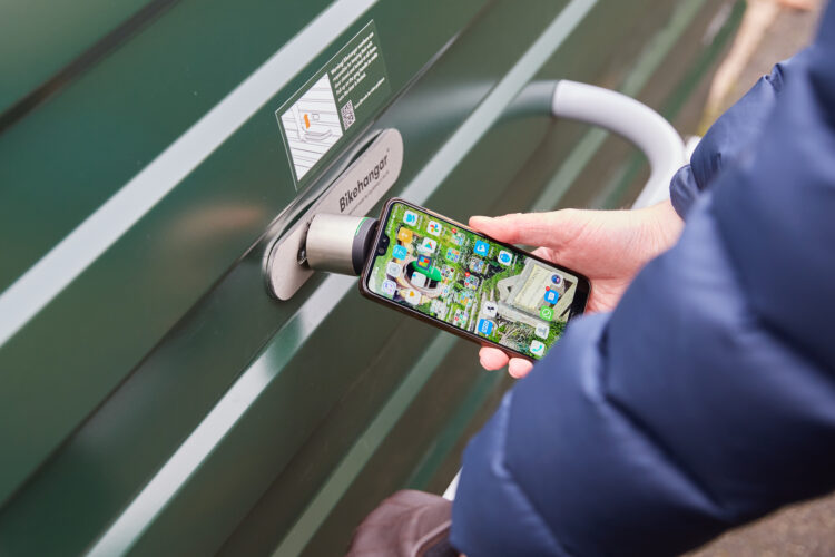 A mobile phone app being used to access a Cyclehoop Bikehangar 4