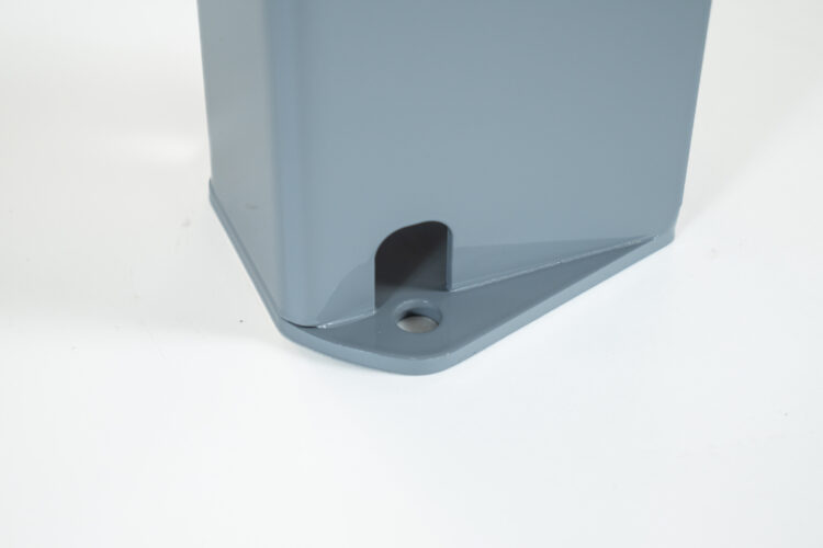 A close-up of the bottom of a metal Wheel Holder stand, showing a hole for a screw to go through.