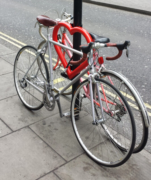 Two bicycles attached to a Cyclehoop Love Hoop