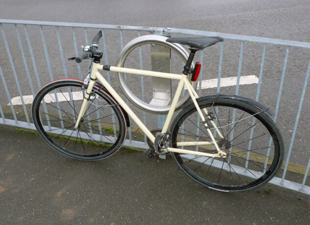 An installed Cyclehoop hoop railing with bicycle attached