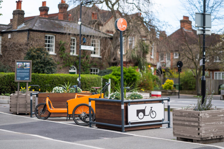 A Cyclehoop Modular Parklet in use