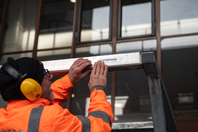 A Cyclehoop Clear Bike Canopy being installed