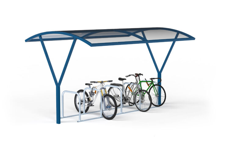Three bikes parked against metal bike racks underneath a clear canopy.