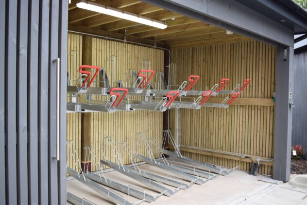 Two tier bike rack in shed