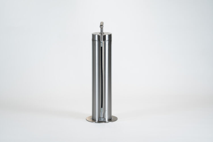 A tall, cylindrical metal bike tire pump.